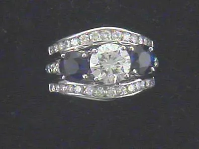 Brilliant Cut Diamond & Sapphire Ring in Platinum Mounting - $50K VALUE